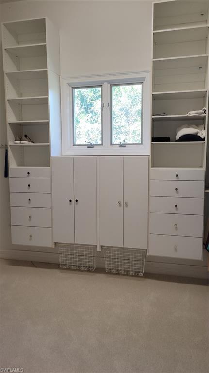 1269 Pocantico Lane Naples, FL 34110 - Photo 31 of 45 a view of a closet with cabinet