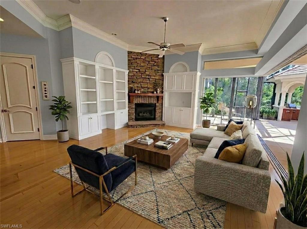 1269 Pocantico Lane Naples, FL 34110 - Photo 6 of 45 a living room with furniture and a large window