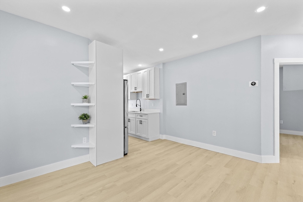 15 Bennett Street Everett, MA 02149 - Photo 27 of 39 wooden floor in an empty room with an empty room