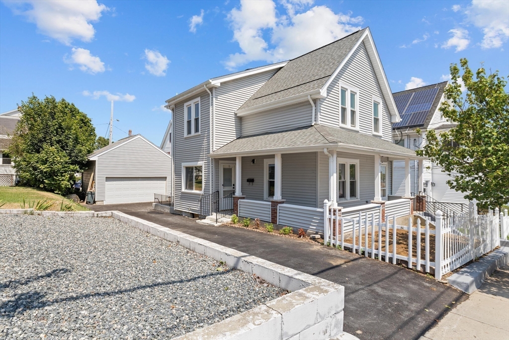 15 Bennett Street Everett, MA 02149 - Photo 34 of 39 a front view of a house with a yard