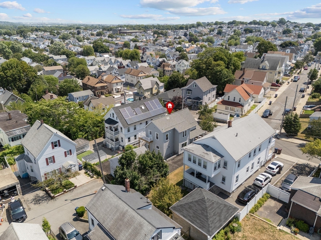 15 Bennett Street Everett, MA 02149 - Photo 36 of 39 an aerial view of a city with lots of residential buildings