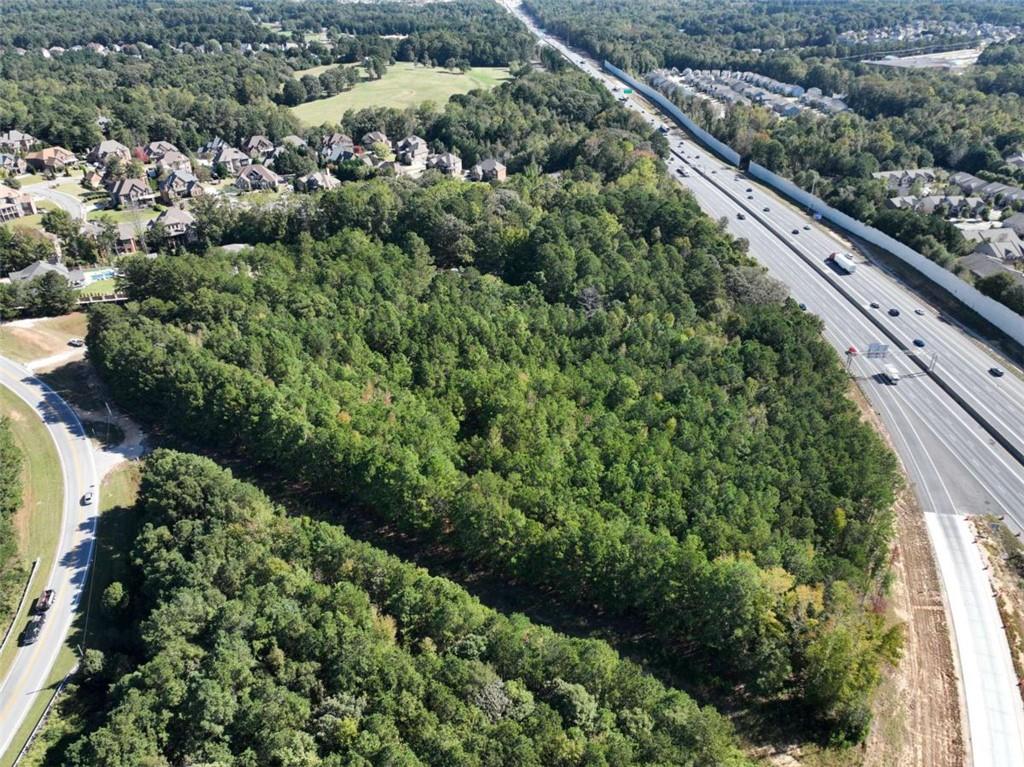 2655 Camp Branch Road Buford, GA 30519 - Photo 2 of 21 a view of a garden with a building