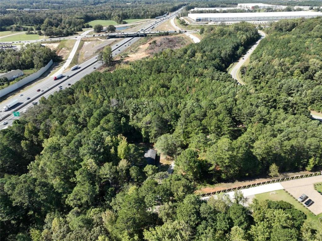 2655 Camp Branch Road Buford, GA 30519 - Photo 3 of 21 an aerial view of a houses with a yard
