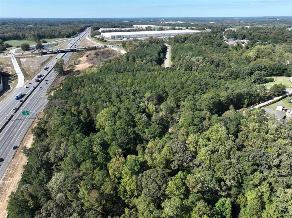 2655 Camp Branch Road Buford, GA 30519 - Photo 4 of 21 an aerial view of a residential houses with outdoor space and trees
