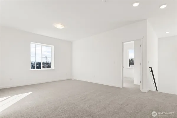 a bathroom with 2 sink tub and a mirror