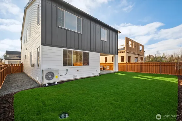 a view of backyard with a garden and stairs