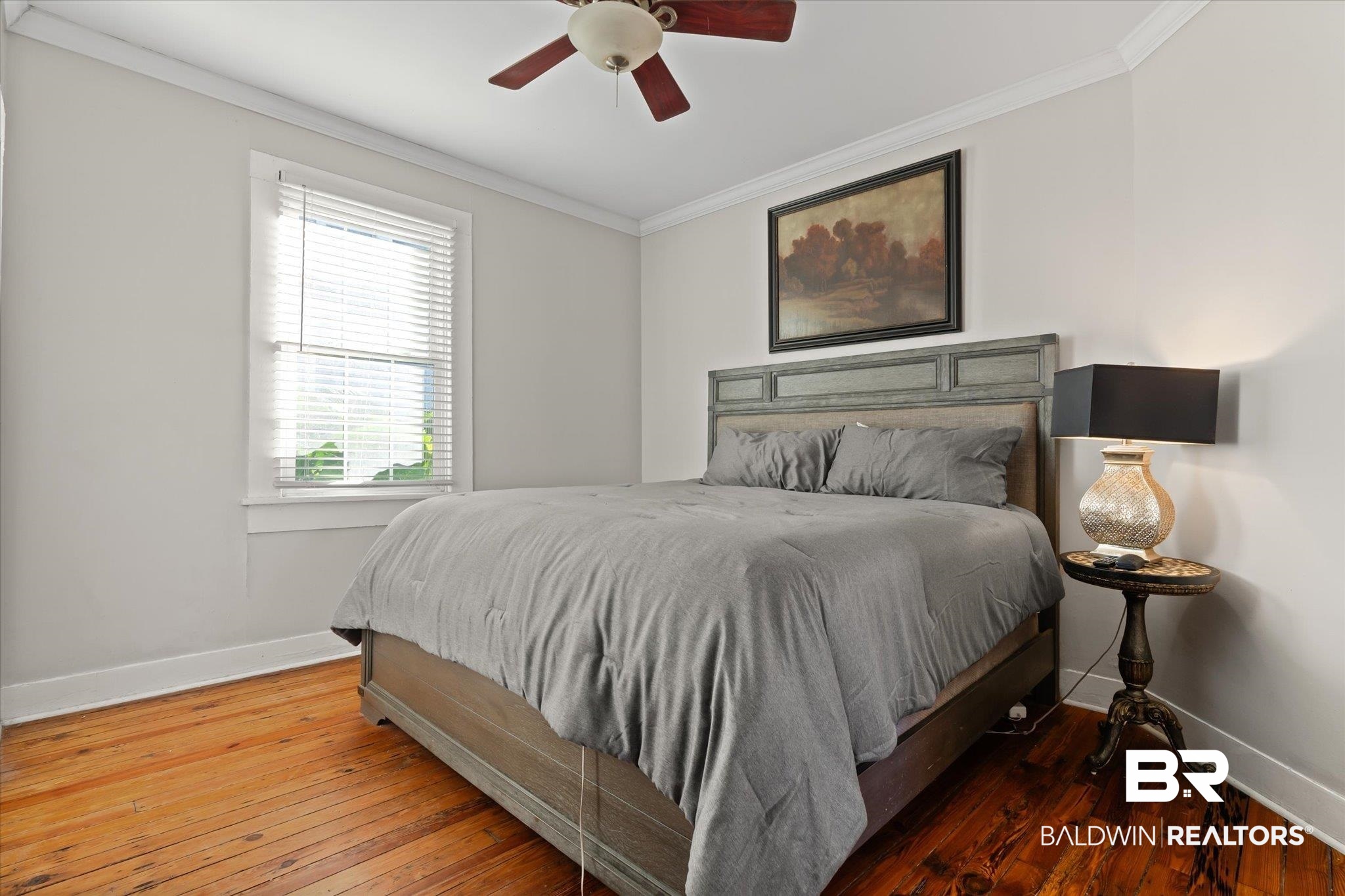 7 Rickarby Place Mobile, AL 36606 - Photo 11 of 20 Bedroom featuring ceiling fan, crown molding, and dark wood-type flooring