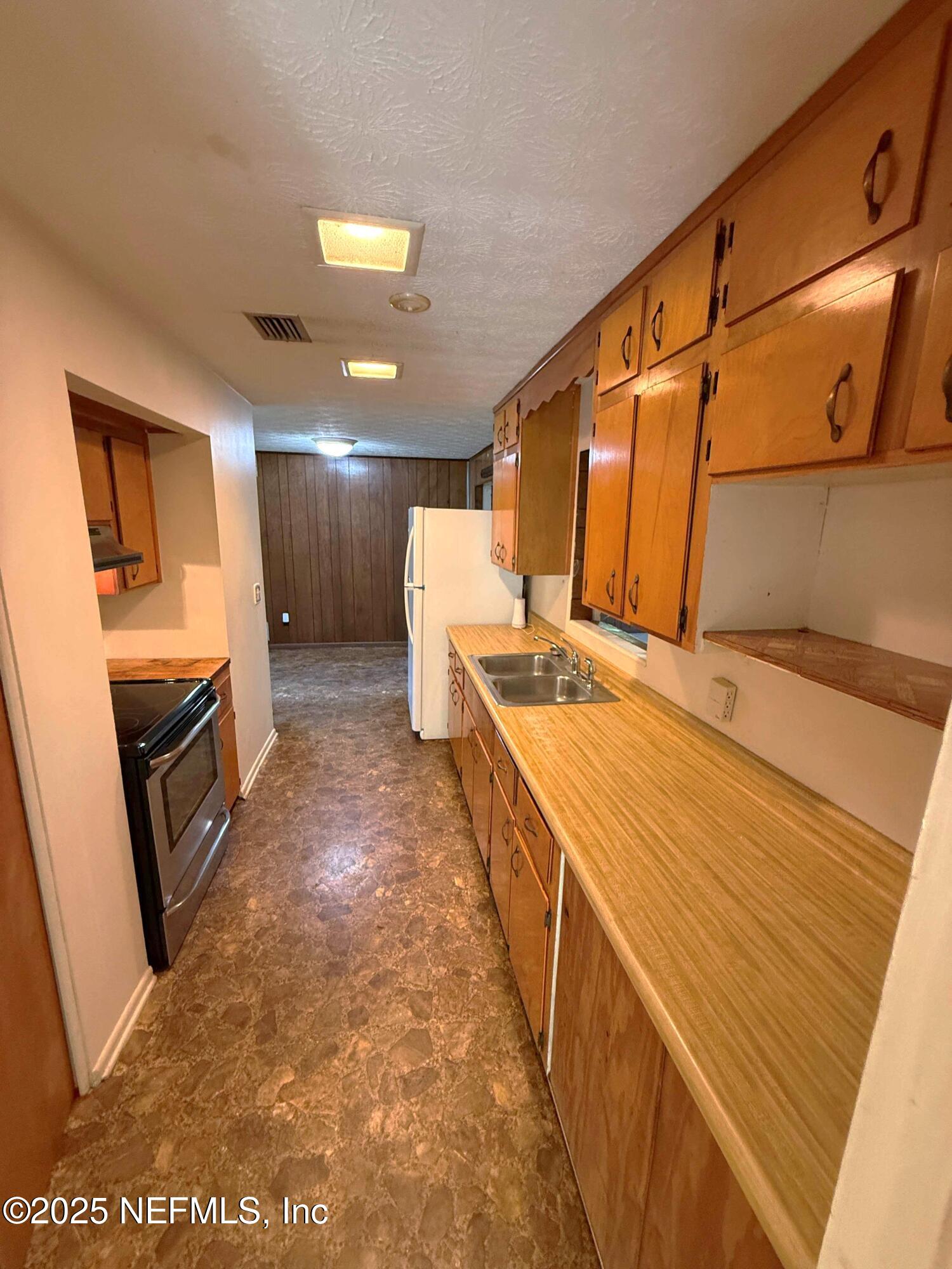 4205 Varner Road Jacksonville, FL 32210 - Photo 11 of 25 Kitchen opp from Office