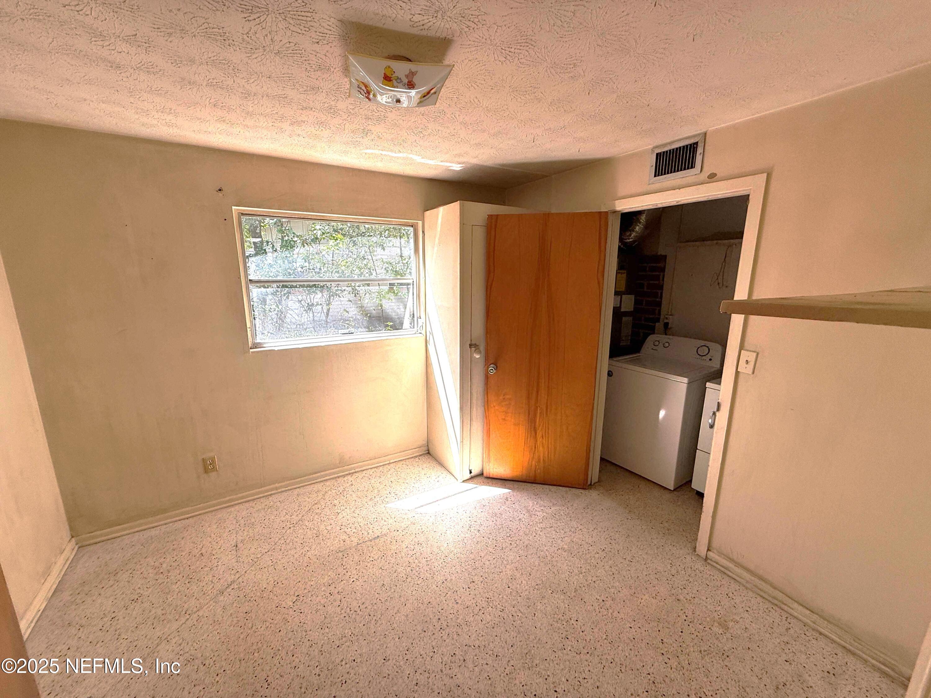 4205 Varner Road Jacksonville, FL 32210 - Photo 18 of 25 Den, Office with laundry