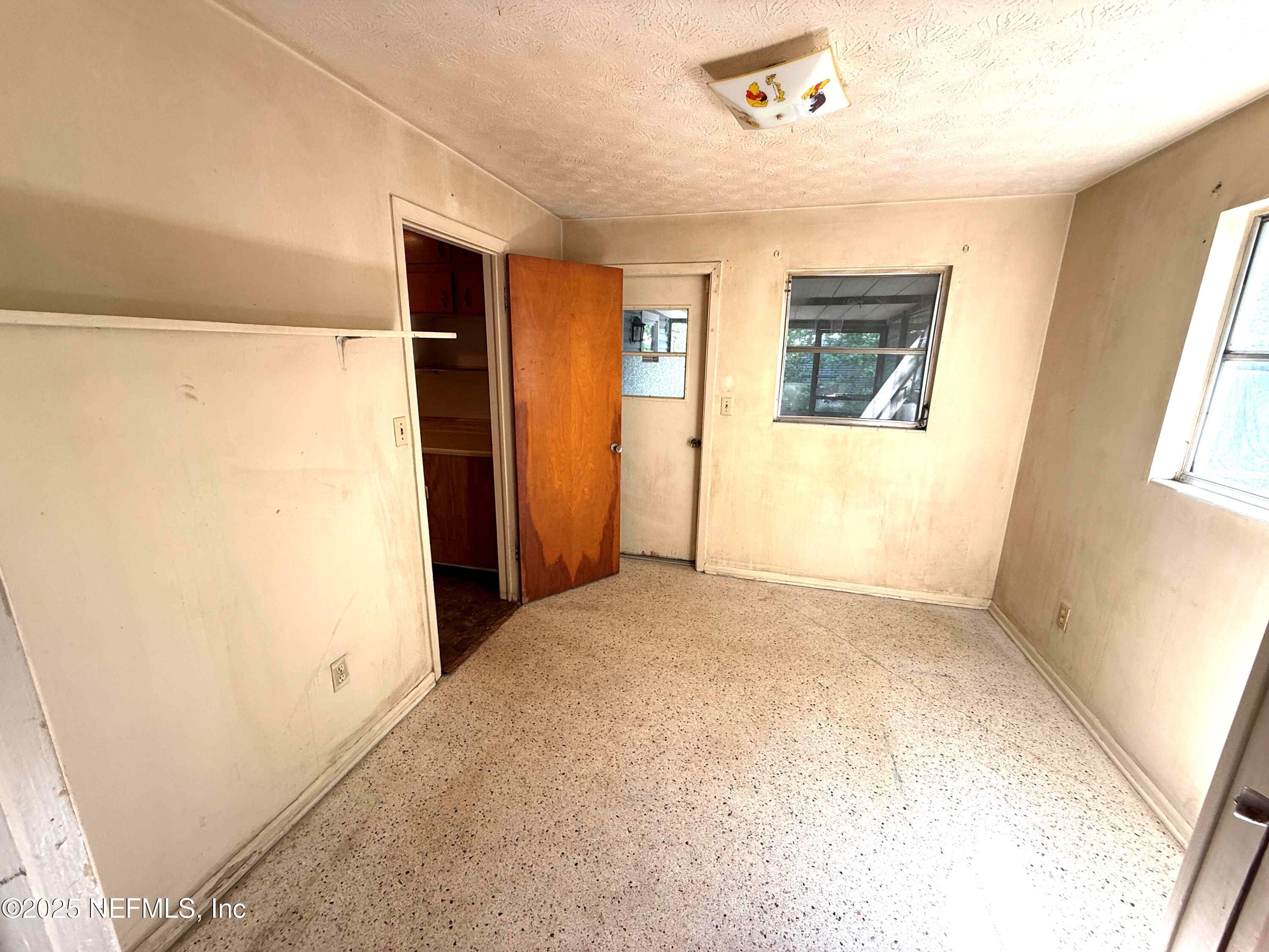 4205 Varner Road Jacksonville, FL 32210 - Photo 19 of 25 Den, Office with access to screen porch