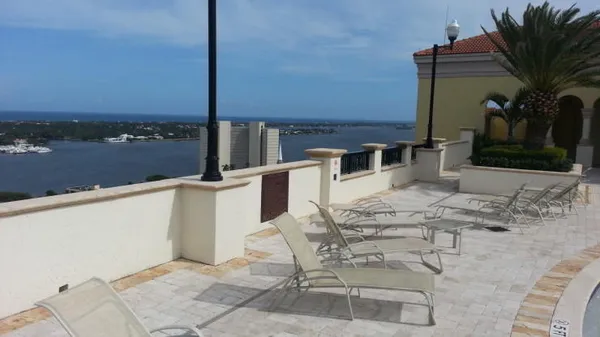 a view of a terrace with chairs