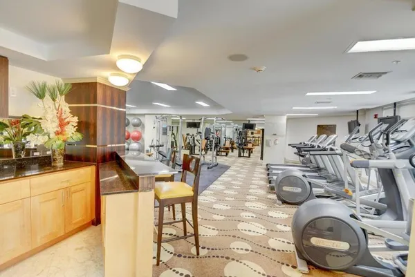 a view of a room with gym equipment