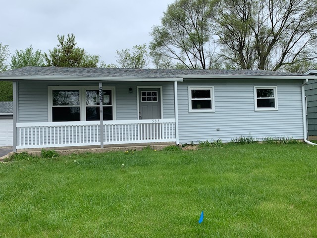 535 Willow Road Wauconda, IL 60084 - Photo 1 of 17 a side view of a house with a garden