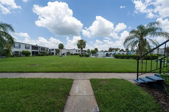 a view of a park with a fountain