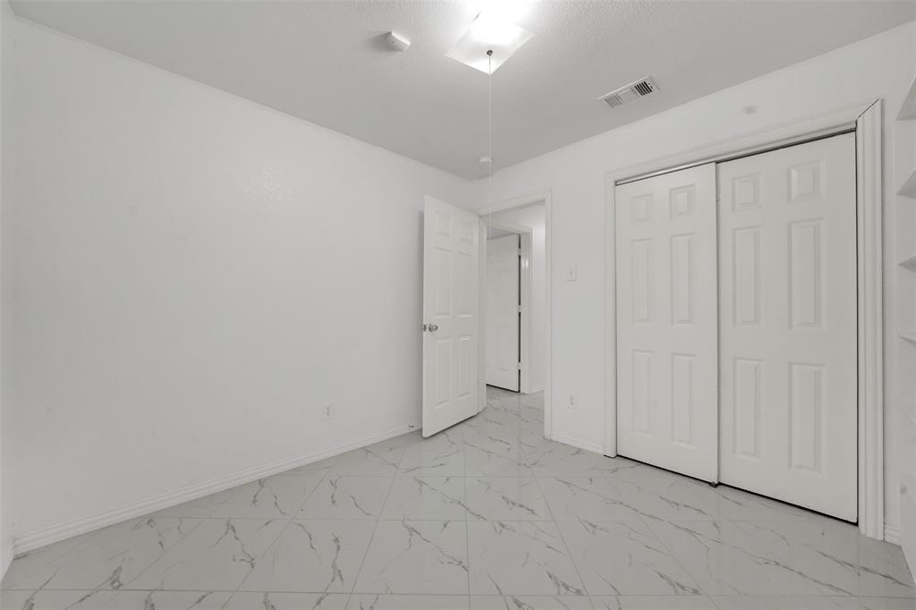 4610 Bucknell Drive Garland, TX 75042 - Photo 11 of 25 a view of an empty room