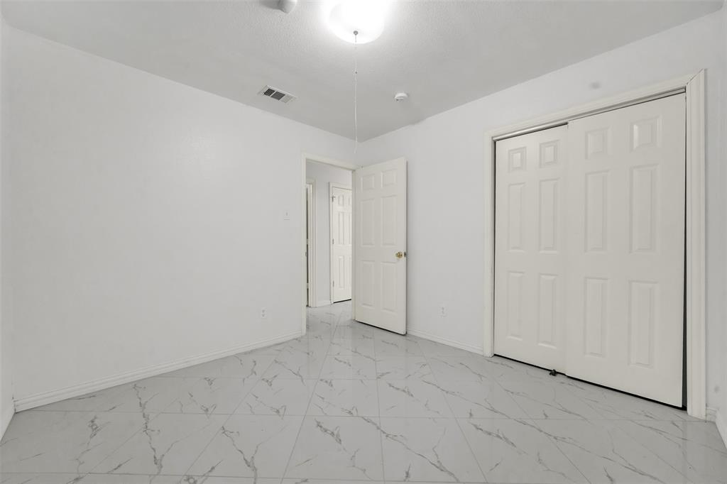 4610 Bucknell Drive Garland, TX 75042 - Photo 19 of 25 a view of an empty room