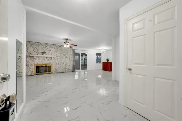 a view of a livingroom with a fireplace