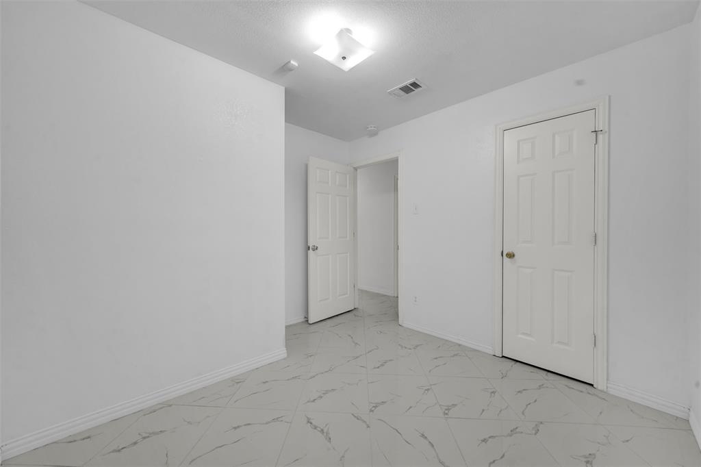4610 Bucknell Drive Garland, TX 75042 - Photo 21 of 25 a view of an empty room