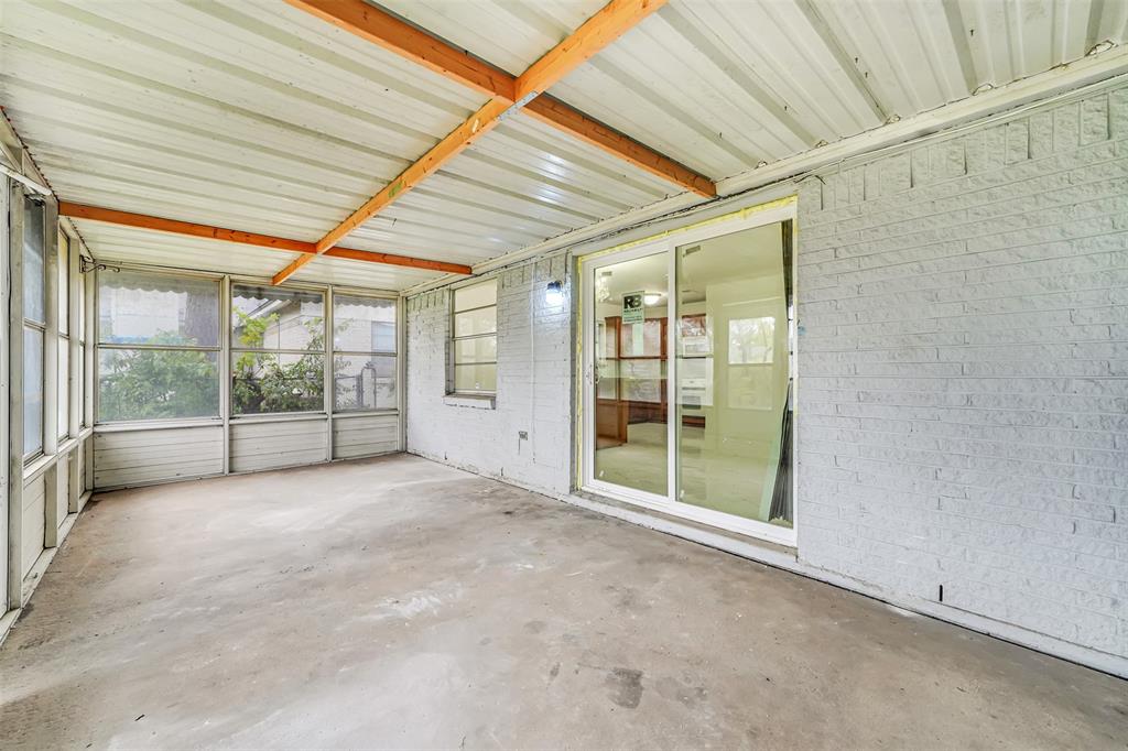 4610 Bucknell Drive Garland, TX 75042 - Photo 22 of 25 a view of a room with large windows
