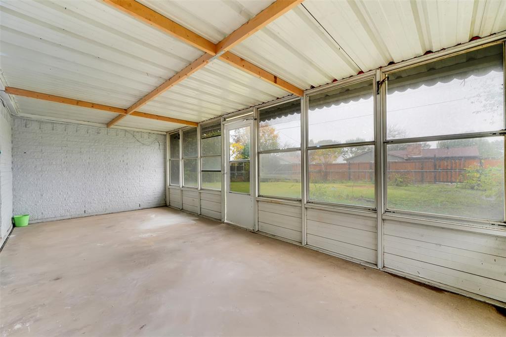4610 Bucknell Drive Garland, TX 75042 - Photo 23 of 25 a view of an empty room with sliding glass door