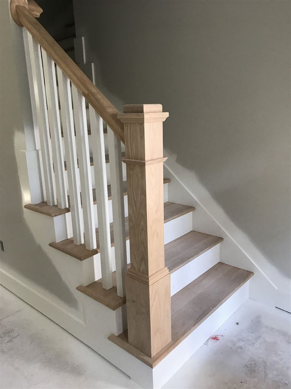 1320 Foxrun Drive Raleigh, NC 27610 - Photo 12 of 24 Site built hardwood stairs w/ open railing and stained newel post Stairwell