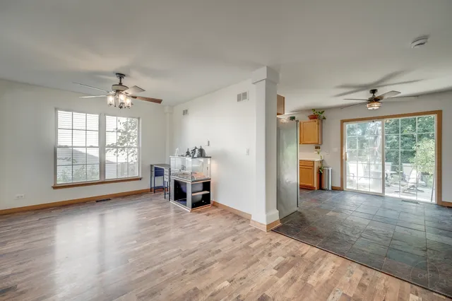 a view of livingroom with furniture wooden floor and window