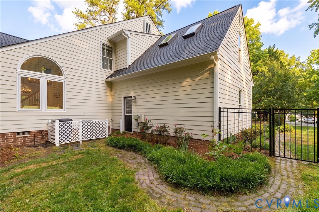 5724 Grove Forest Road Midlothian, VA 23112 - Photo 47 of 47 Exterior siding with a prominent arched window, br