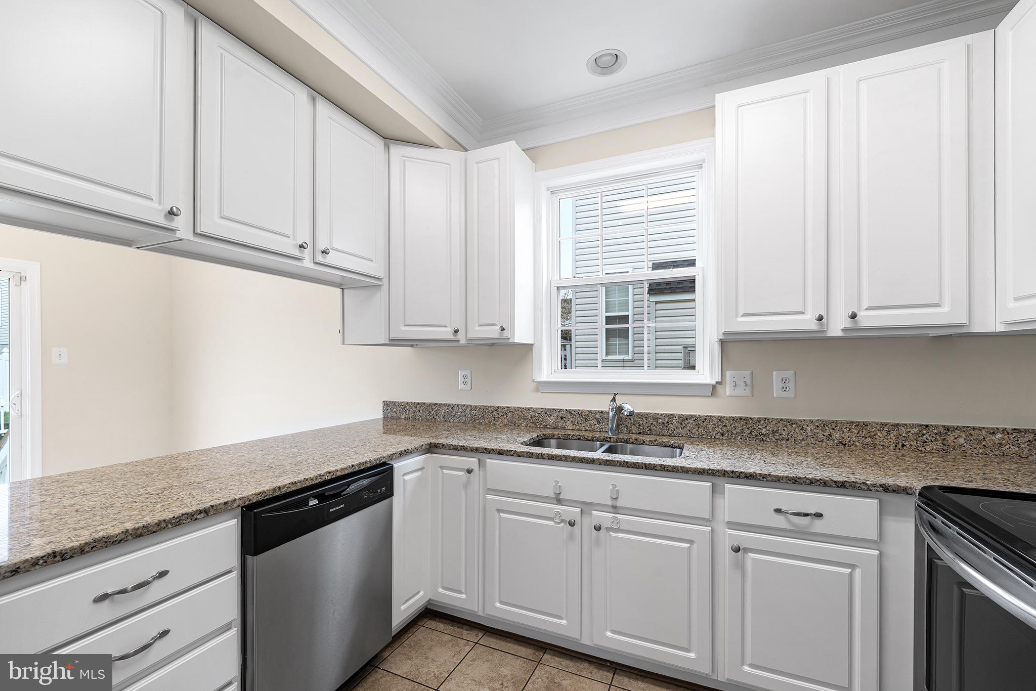 31 Dunmore Drive Hanover, PA 17331 - Photo 16 of 55 a kitchen with granite countertop white cabinets and a sink