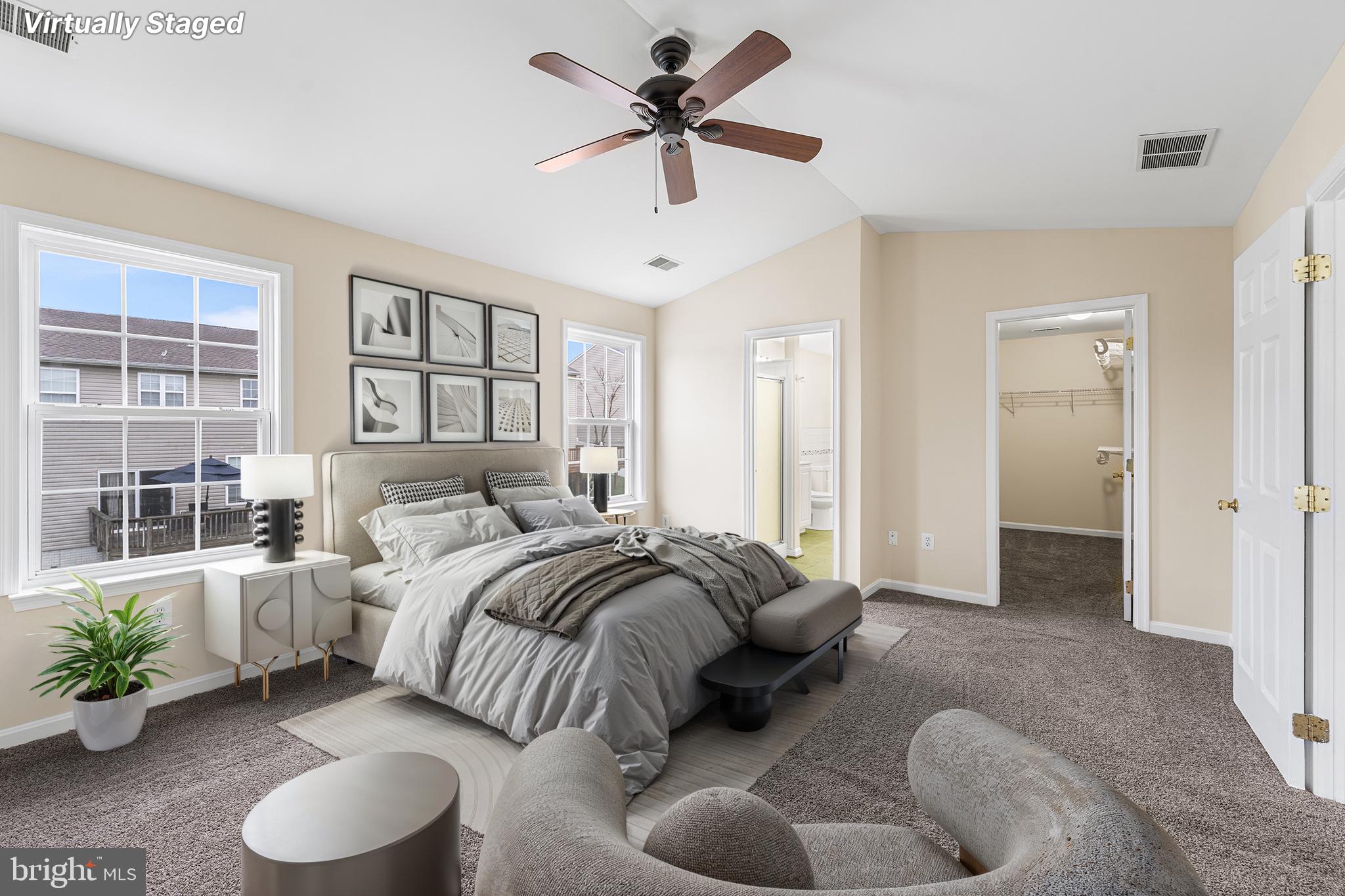 31 Dunmore Drive Hanover, PA 17331 - Photo 21 of 55 a spacious bedroom with a bed and a chandelier