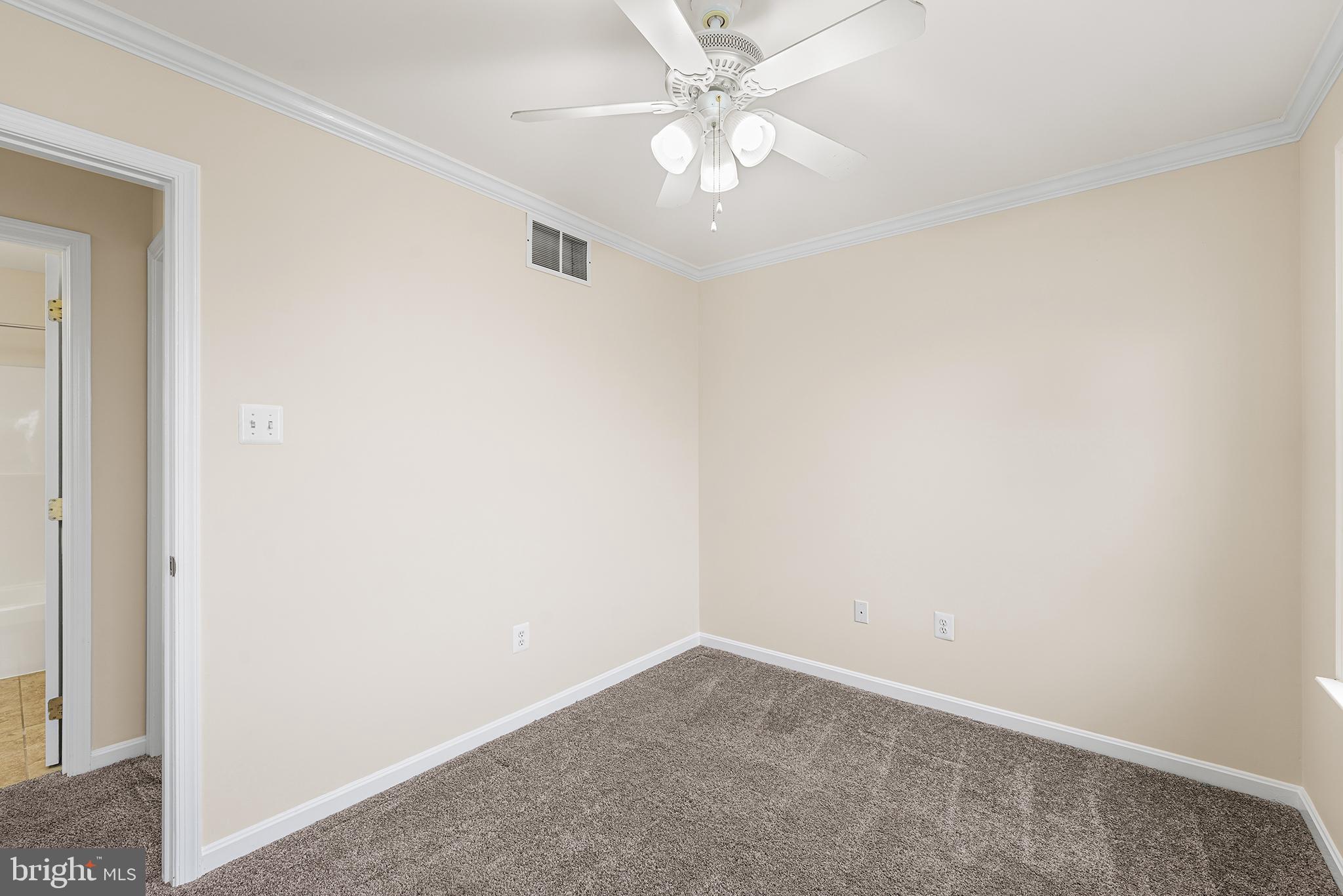 31 Dunmore Drive Hanover, PA 17331 - Photo 23 of 55 an empty room with a ceiling fan and a window