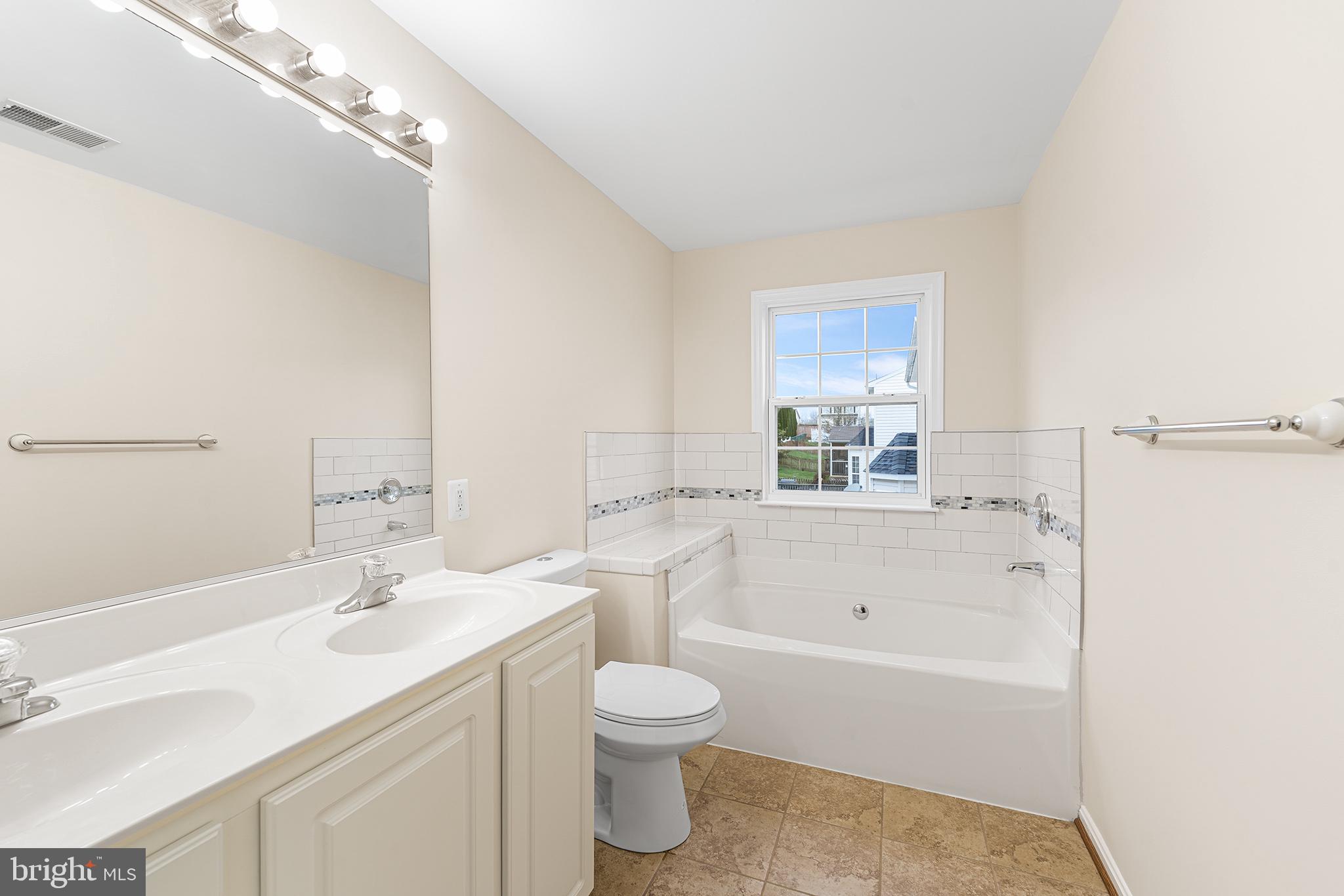 31 Dunmore Drive Hanover, PA 17331 - Photo 29 of 55 a bathroom with a granite countertop sink a toilet and bathtub