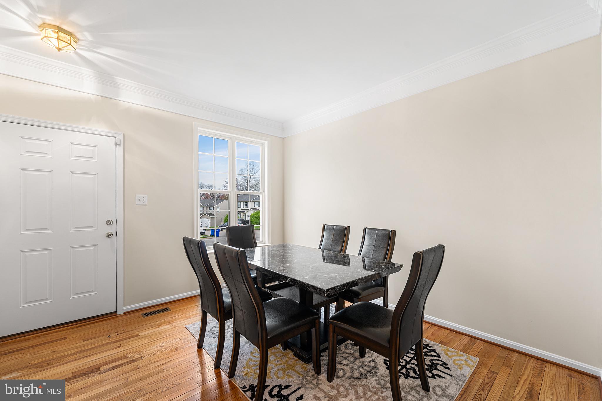31 Dunmore Drive Hanover, PA 17331 - Photo 4 of 55 a view of a dining room with furniture and wooden floor