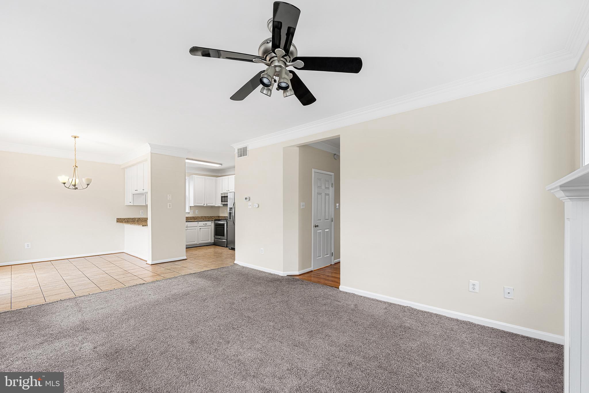 31 Dunmore Drive Hanover, PA 17331 - Photo 10 of 55 a view of a livingroom with a ceiling fan and kitchen space
