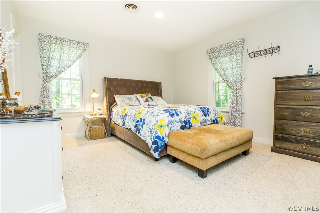 4115 Poplar Grove Road Midlothian, VA 23112 - Photo 16 of 36 a bedroom with a bed lamp and a window