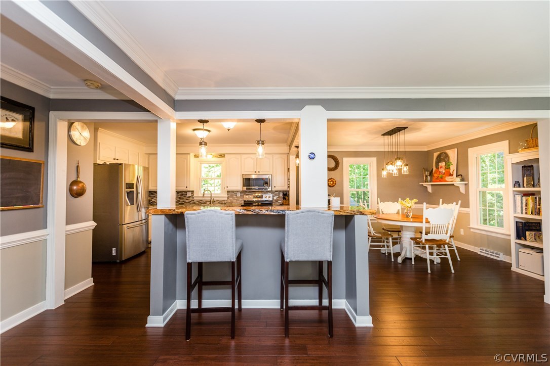 4115 Poplar Grove Road Midlothian, VA 23112 - Photo 2 of 36 a view of a dining room with furniture window and wooden floor
