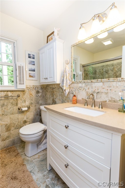 4115 Poplar Grove Road Midlothian, VA 23112 - Photo 22 of 36 a bathroom with a granite countertop toilet sink and mirror