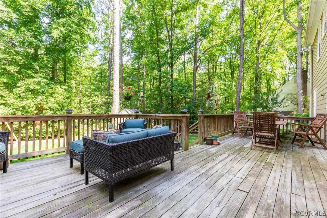 4115 Poplar Grove Road Midlothian, VA 23112 - Photo 25 of 36 a view of a wooden deck with chairs