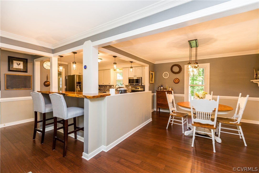 4115 Poplar Grove Road Midlothian, VA 23112 - Photo 3 of 36 a dining room with furniture window and wooden floor