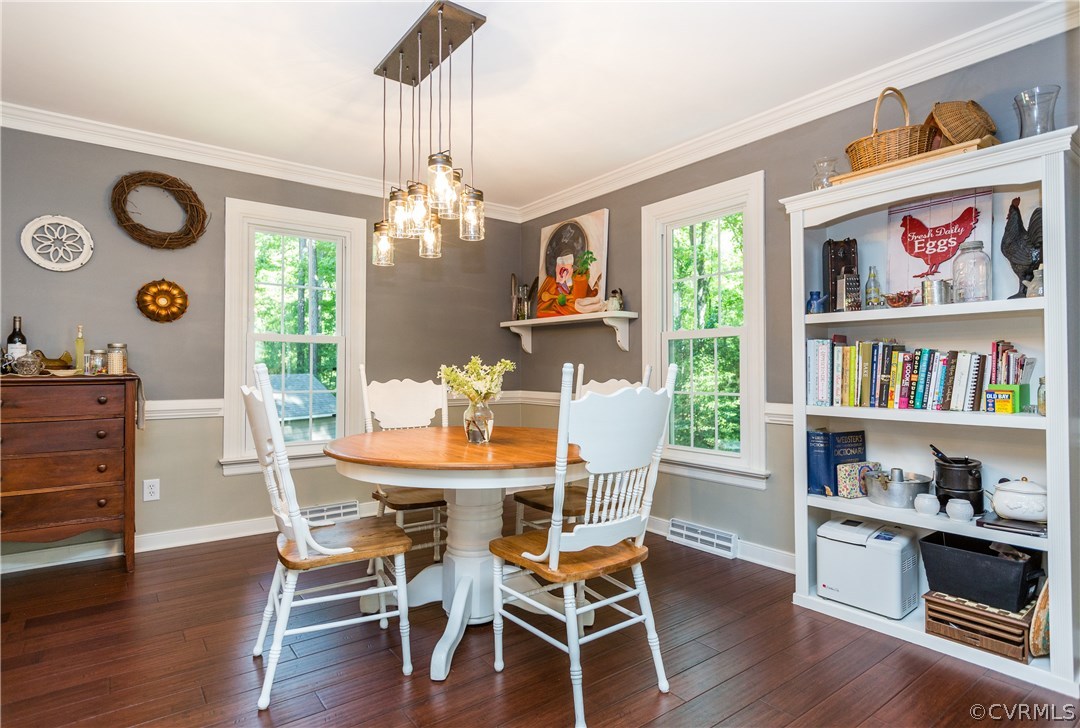 4115 Poplar Grove Road Midlothian, VA 23112 - Photo 9 of 36 a view of a dining room with furniture window and wooden floor