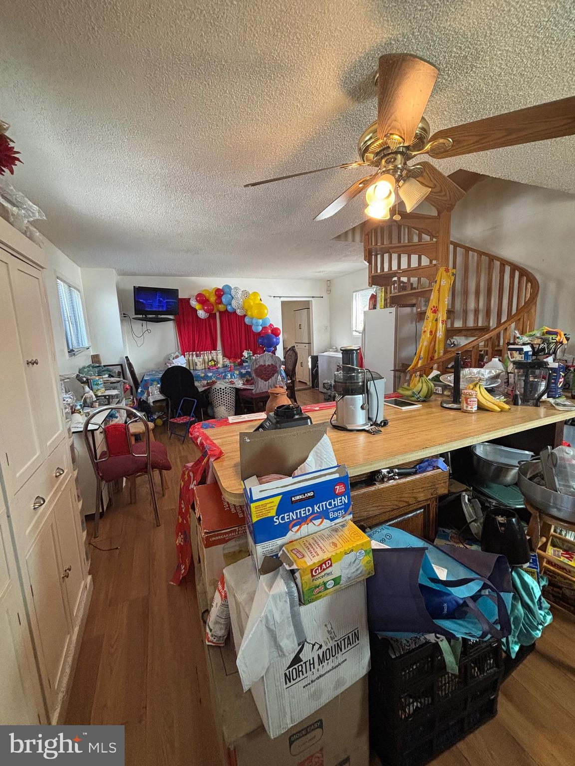 7 Mabel Street Trenton, NJ 08638 - Photo 15 of 20 a living room with furniture kitchen view and a chandelier