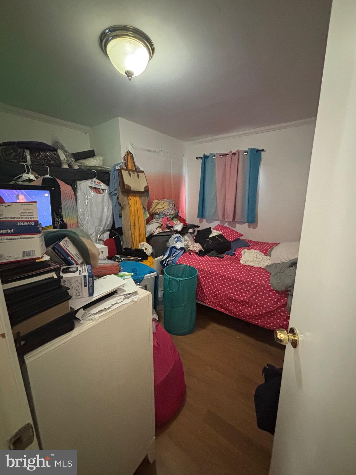 7 Mabel Street Trenton, NJ 08638 - Photo 18 of 20 a room with gym equipment and a mirror