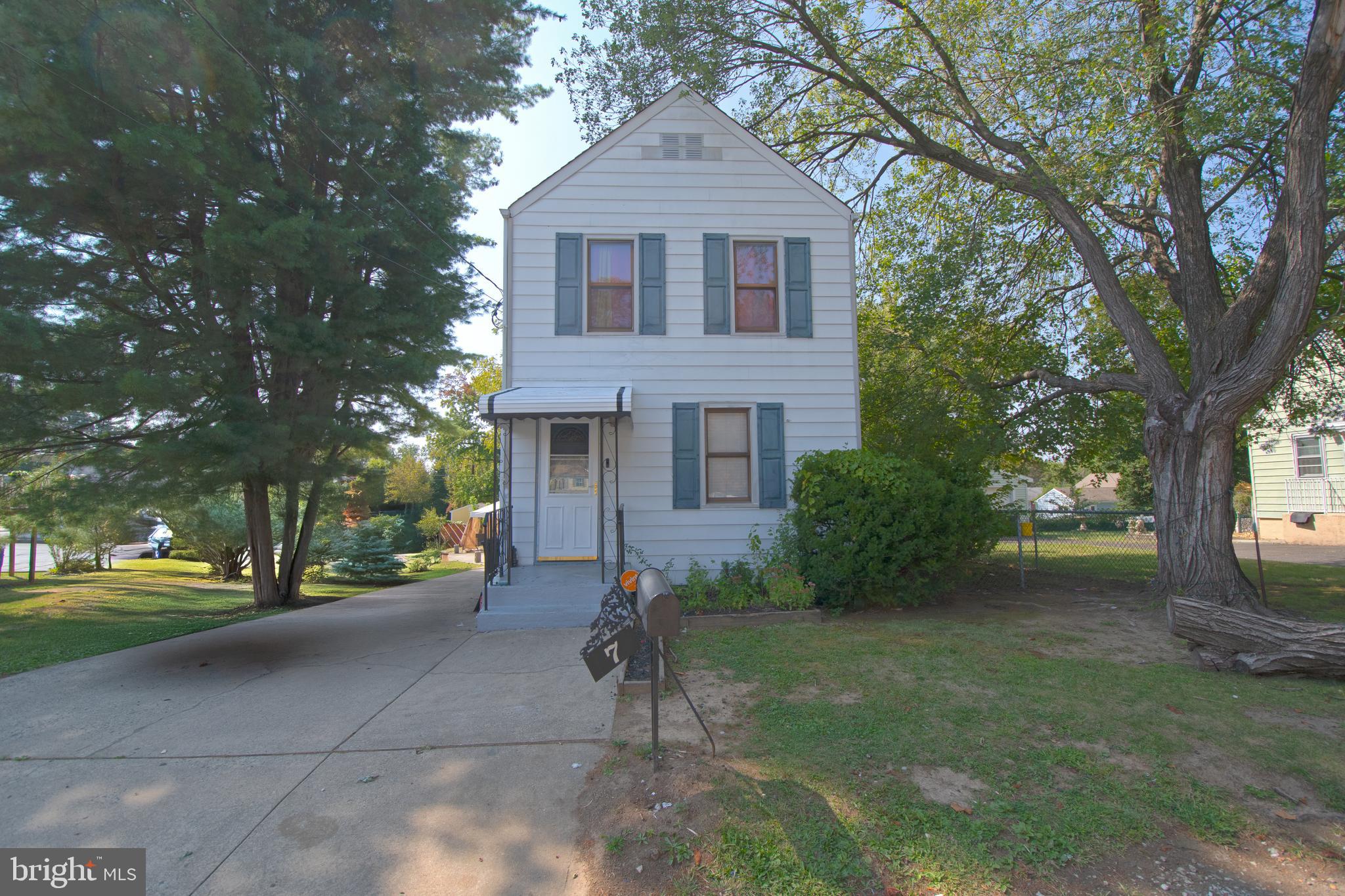 7 Mabel Street Trenton, NJ 08638 - Photo 2 of 20 a front view of a house with a yard