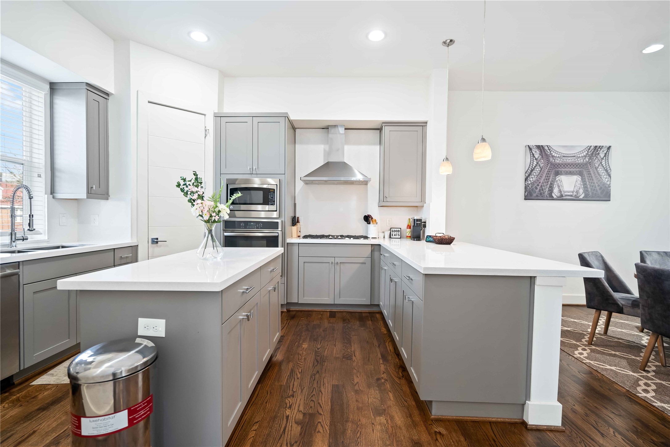 2004 Rosedale Street, Unit F Houston, TX 77004 - Photo 13 of 33 a kitchen with a sink stove and cabinets