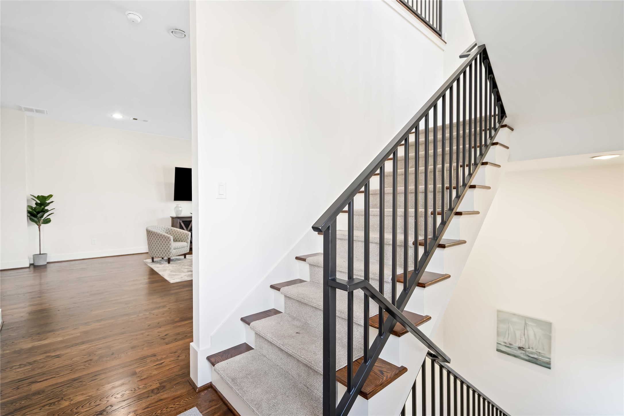 2004 Rosedale Street, Unit F Houston, TX 77004 - Photo 19 of 33 a view of entryway and hall with wooden floor