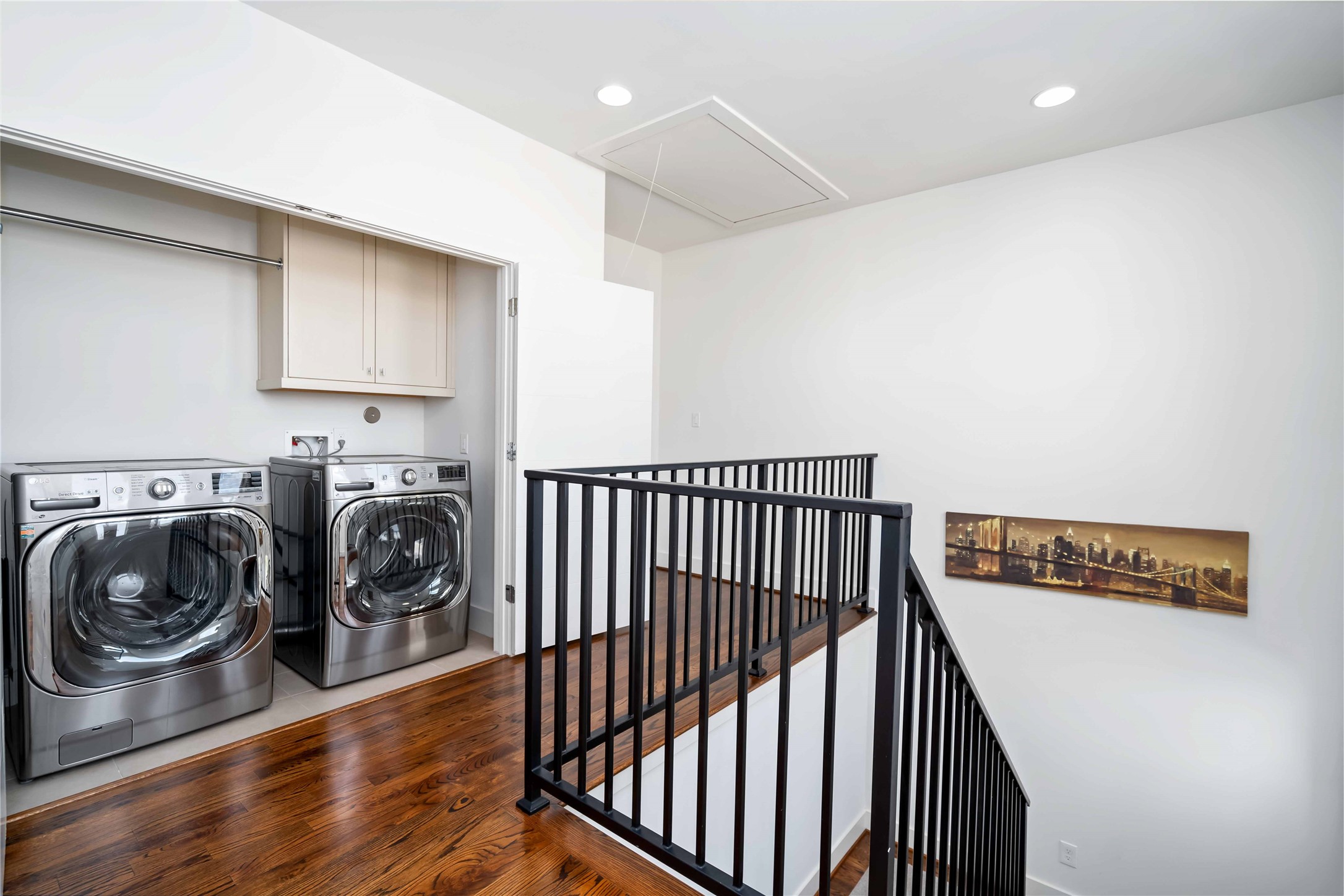 2004 Rosedale Street, Unit F Houston, TX 77004 - Photo 2 of 33 a view of a storage & utility room with washer and dryer