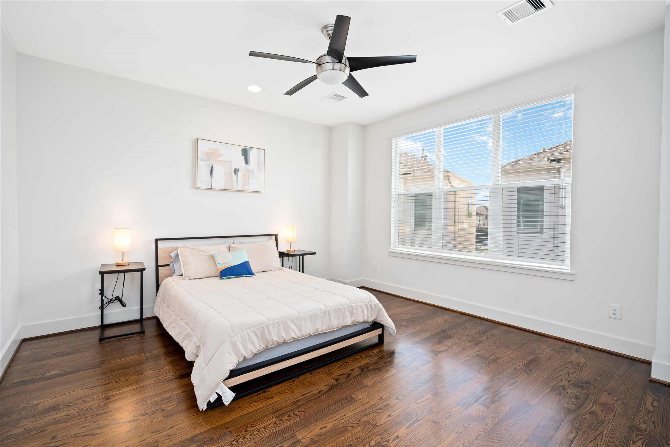 2004 Rosedale Street, Unit F Houston, TX 77004 - Photo 26 of 33 a bedroom with a bed and window