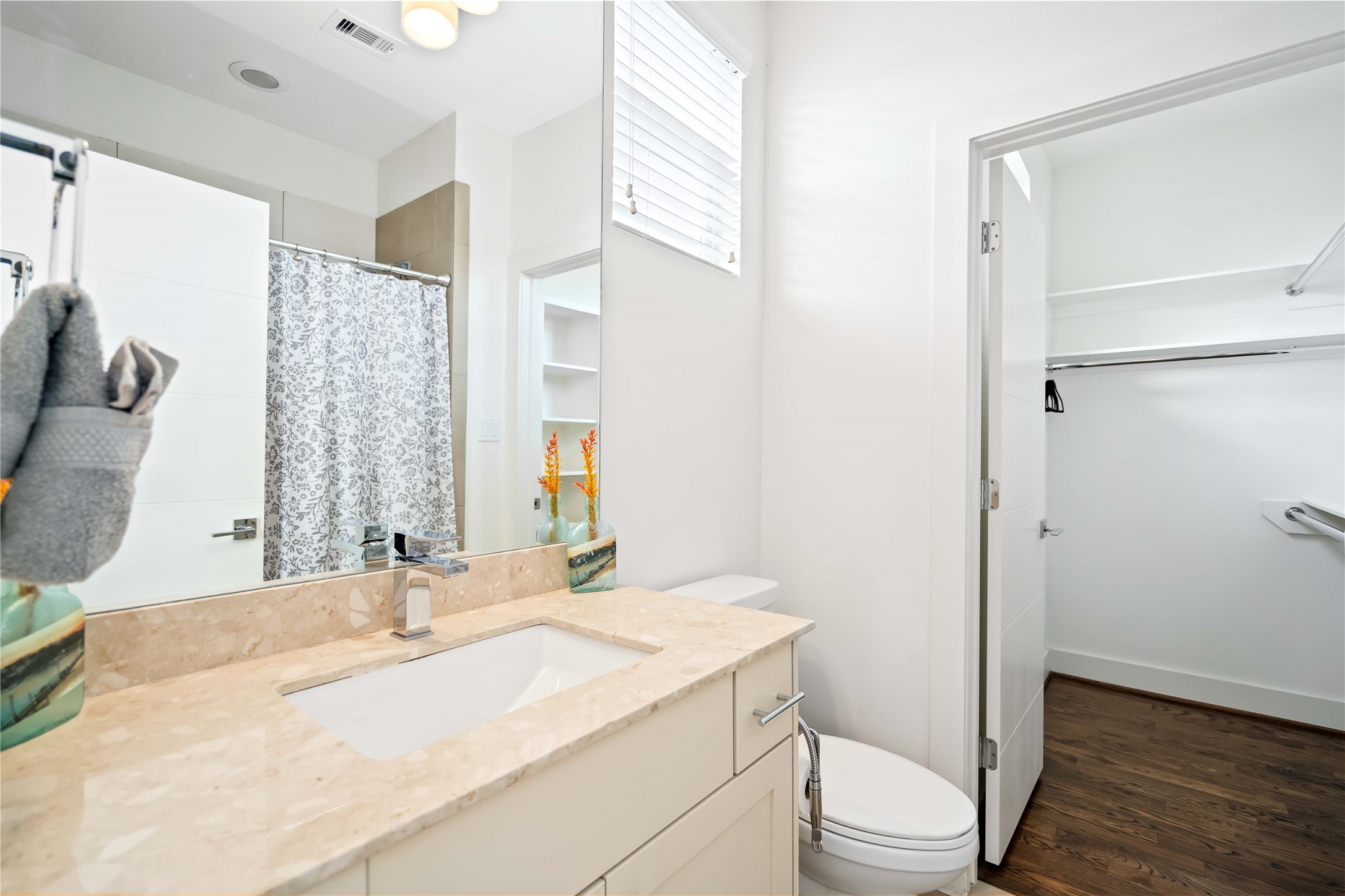 2004 Rosedale Street, Unit F Houston, TX 77004 - Photo 28 of 33 a bathroom with a granite countertop sink toilet and shower