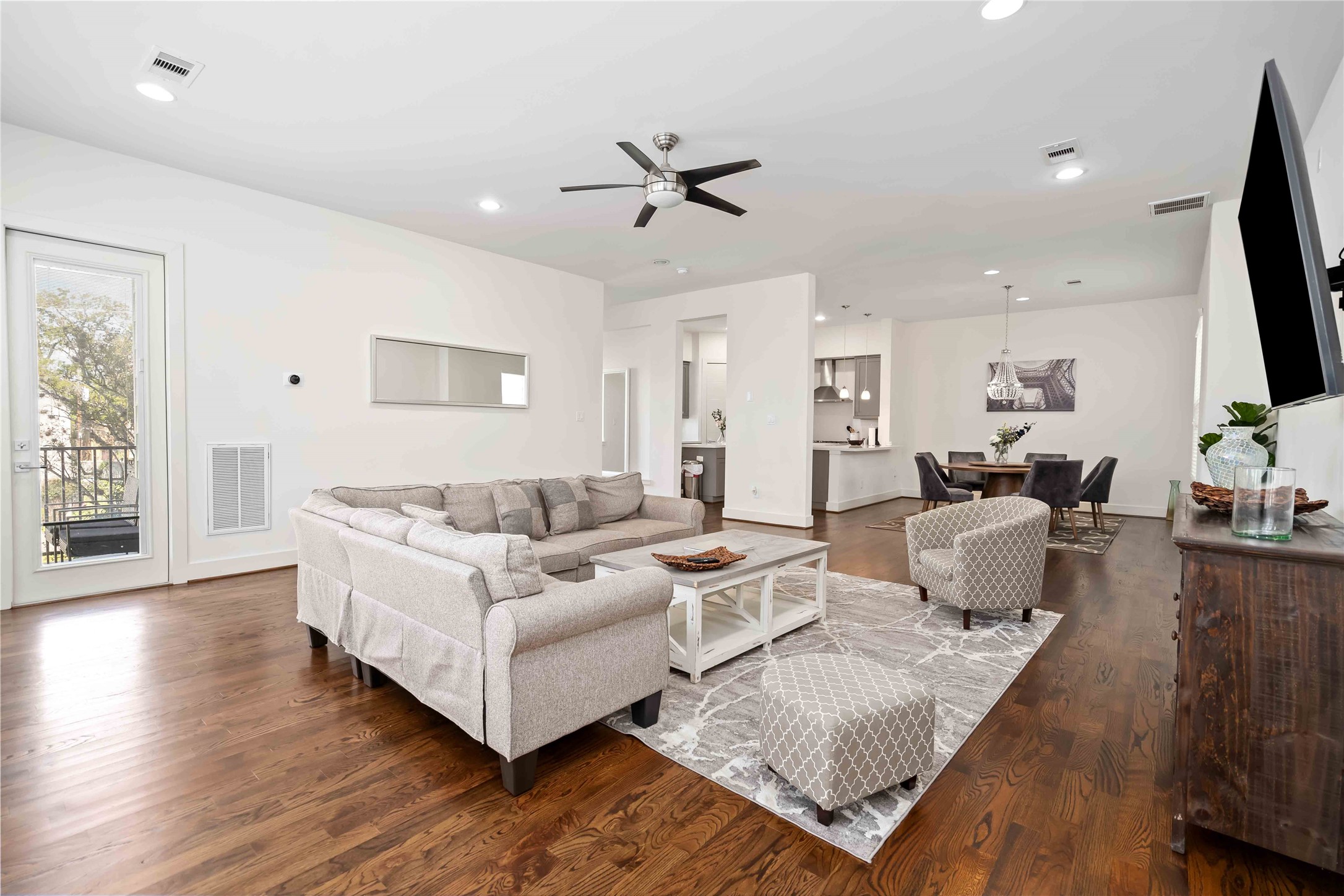 2004 Rosedale Street, Unit F Houston, TX 77004 - Photo 3 of 33 a living room with furniture and a flat screen tv