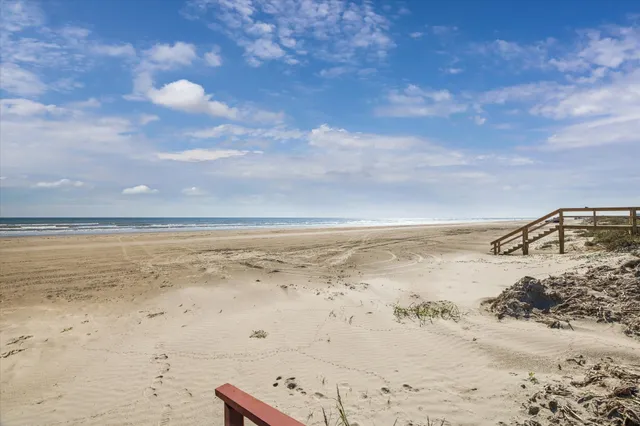 a view of beach and ocean