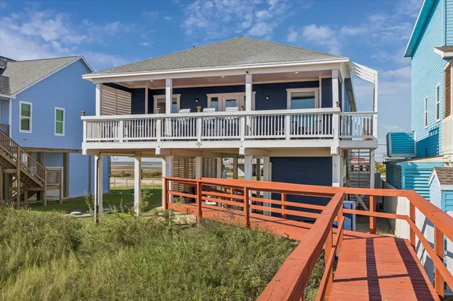 a backyard of a house with seating space